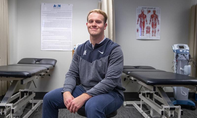 Master of Athletic Training student sits in classroom.